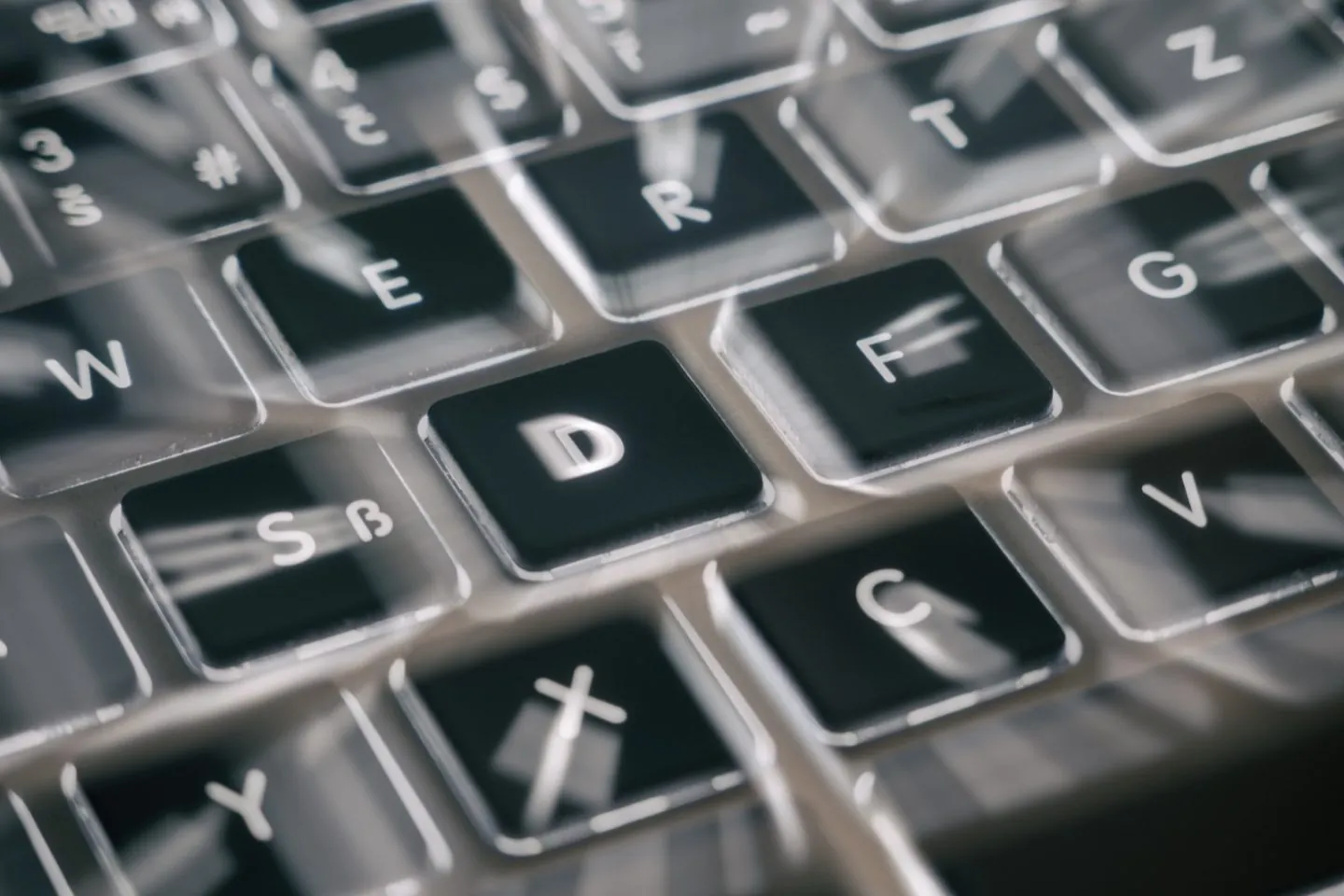 Backlit laptop keyboard, illustrating the consumer hardware Muse Glimmer is built to run on