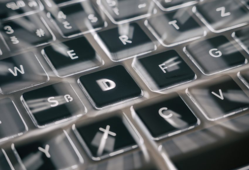 Backlit laptop keyboard, illustrating the consumer hardware Muse Glimmer is built to run on