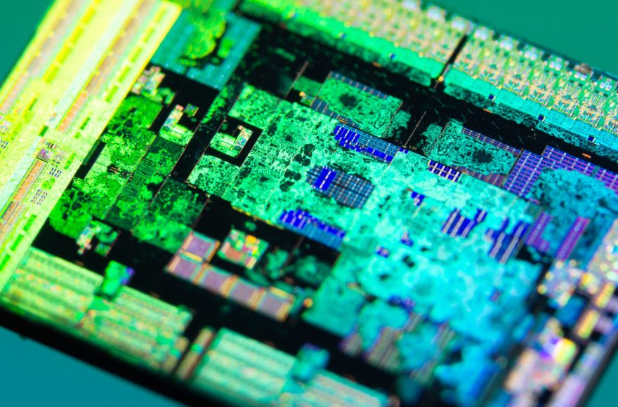 Photograph of an AMD Zen 2 Matisse compute die showing the processor core layout