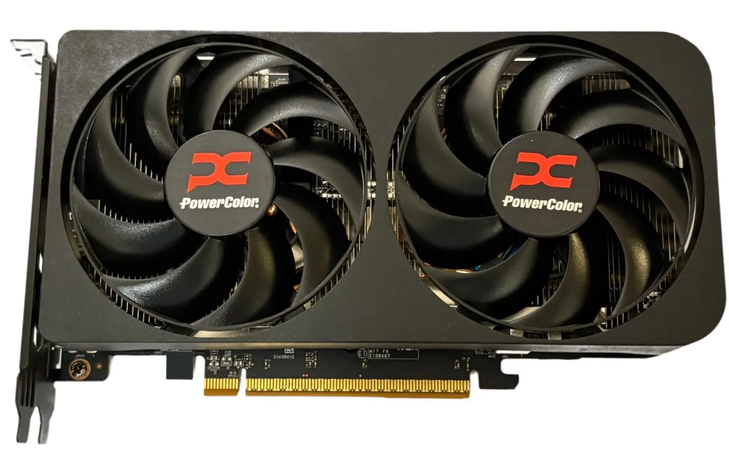 AMD Radeon RX 9060 XT graphics card (PowerColor) on a desk
