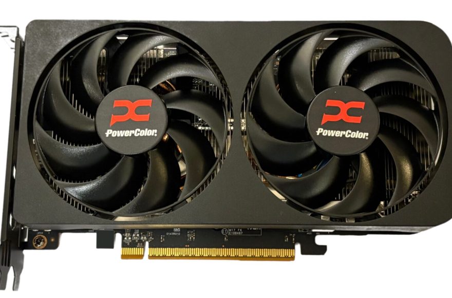 AMD Radeon RX 9060 XT graphics card (PowerColor) on a desk