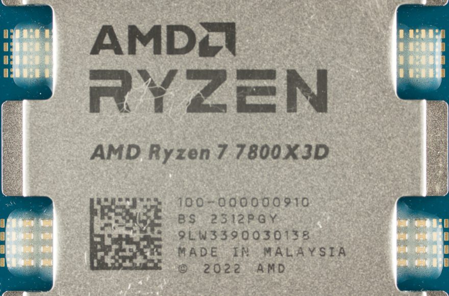 Photograph of a Ryzen 7 7800X3D processor die showing the stacked 3D V-Cache CCD