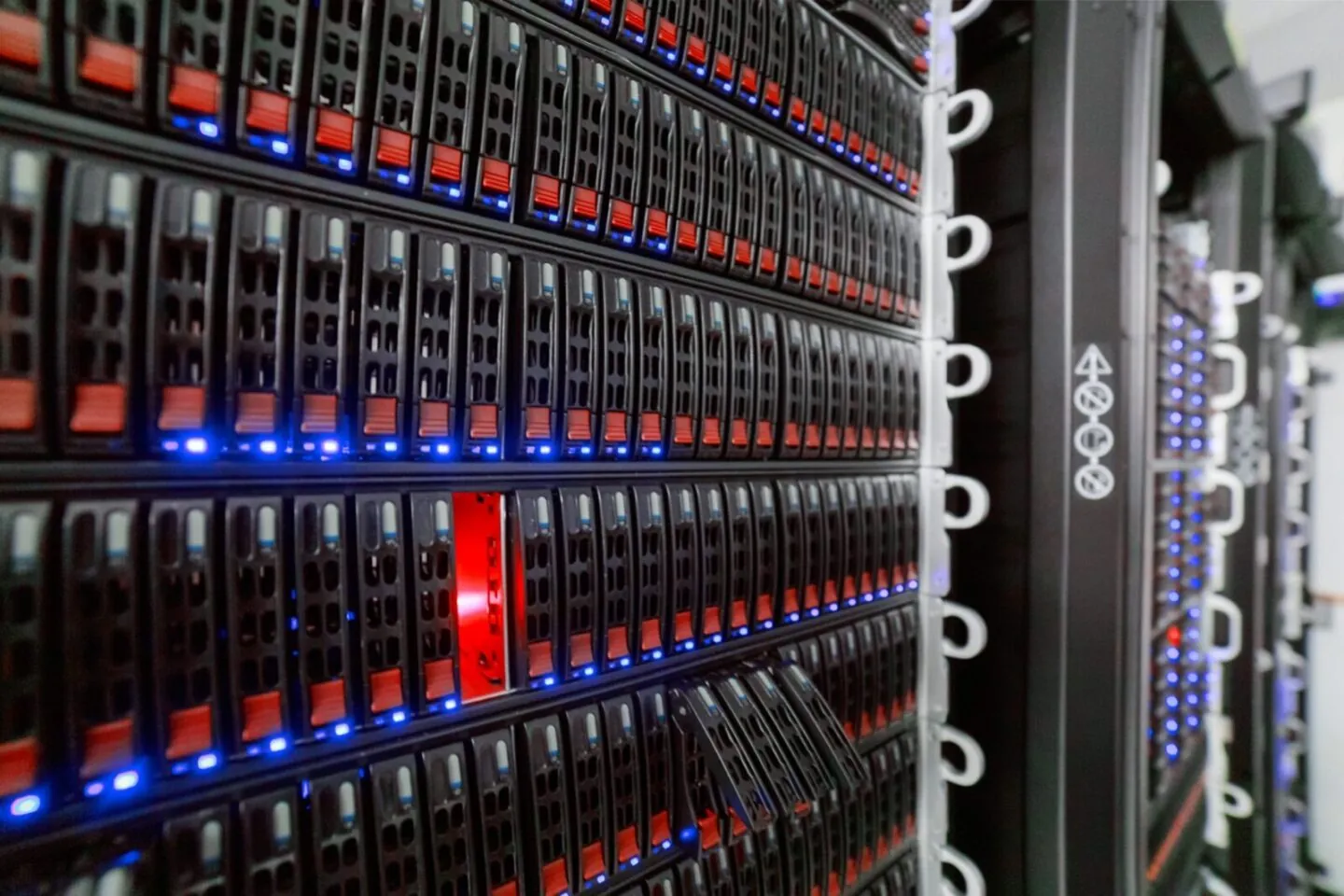 Illustrative server racks at NOIRLab's Tucson headquarters; these are not AMD Helion systems.